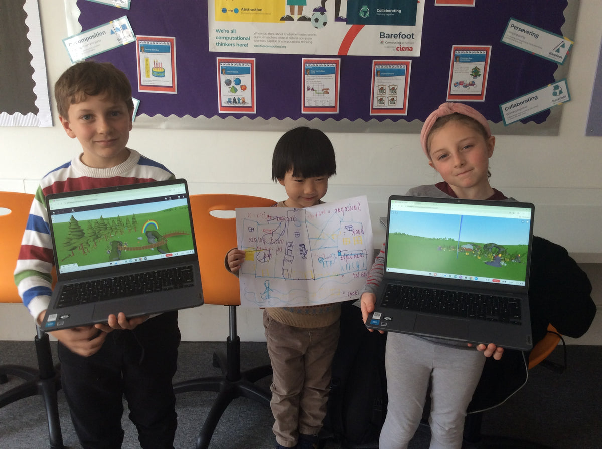 Children coding on laptops at BetaGen's holiday camp in Notting Hill